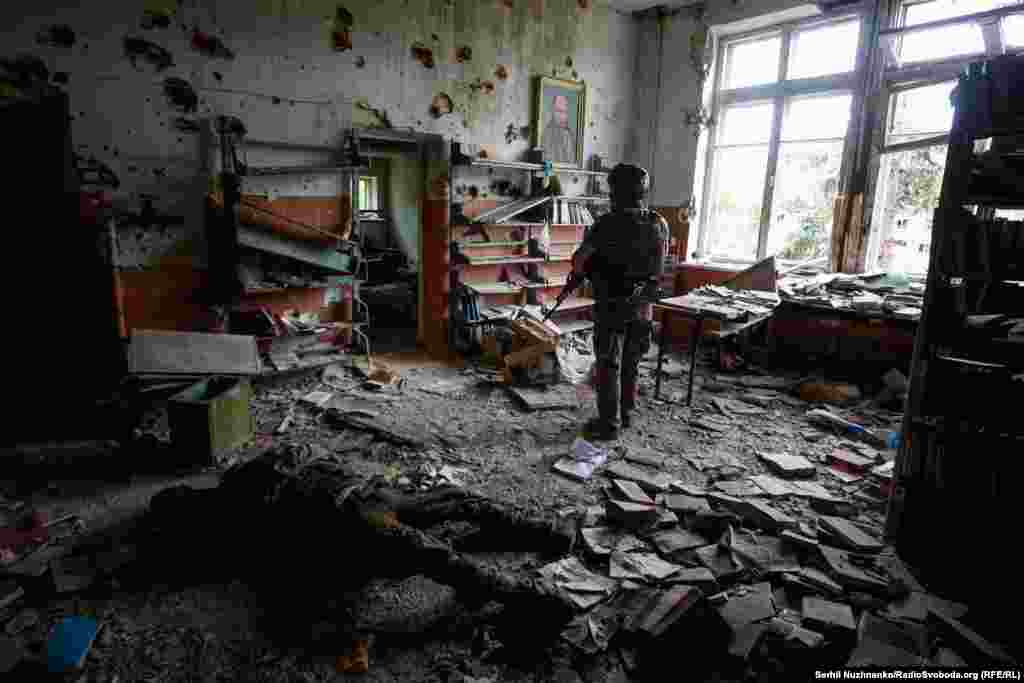 A Ukrainian soldier in a battle-damaged building in Blahodatne in the Donetsk Region on June 17, 2023. 
