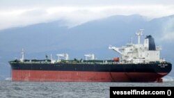An online tracking service has identified the ship as the St. Nikolas, which was previously called the Suez Rajan.