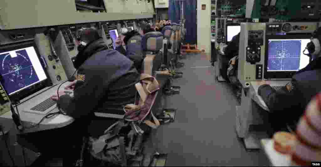 Radar officers inside an A-50 during a training flight. The surveillance planes are a highly valuable target due to their cost -- up to half a billion dollars per aircraft -- and the real-time situational awareness they provide to the Russian war machine. The aircraft serves as a kind of airborne “control tower" with 360 degree radar capable of tracking and identifying aircraft or ships from hundreds of kilometers away.   