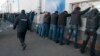 Облава полиции на мигрантов на складе сельхозпродукции в Москве, 2013