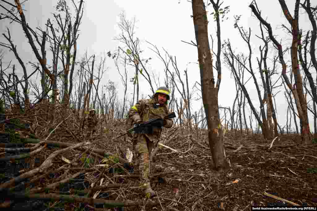 Ukrainian soldiers seen after the storming of a Russian position near Bakhmut in May 2023. 