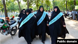 Female members of Iran's morality police patrol the streets in Tehran looking for women violating the mandatory law on wearing head scarves. 