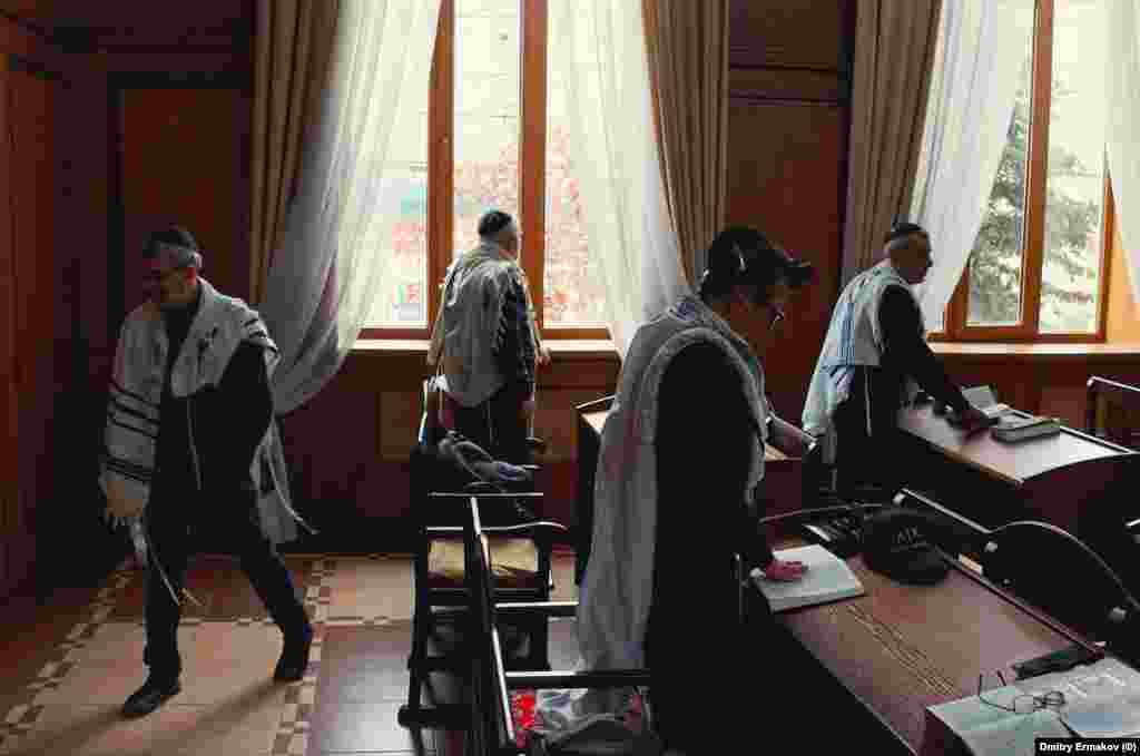 Jews pray inside the Derbent synagogue in April 2023. The Jewish population of Daghestan now say they are in fear for their lives. Recent images of the community are rare, but in April 2023, Russian photographer Dmitry Ermakov made an extensive photo report on the Jews of Derbent, a city in Daghestan where most of the minority resides. The following photos were made on that trip.   