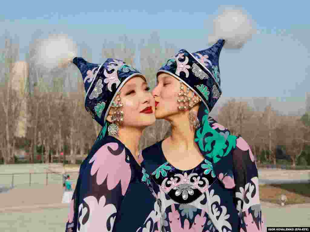 Kyrgyz women wearing traditional costumes celebrate at  Ala-Too Square in Bishkek.