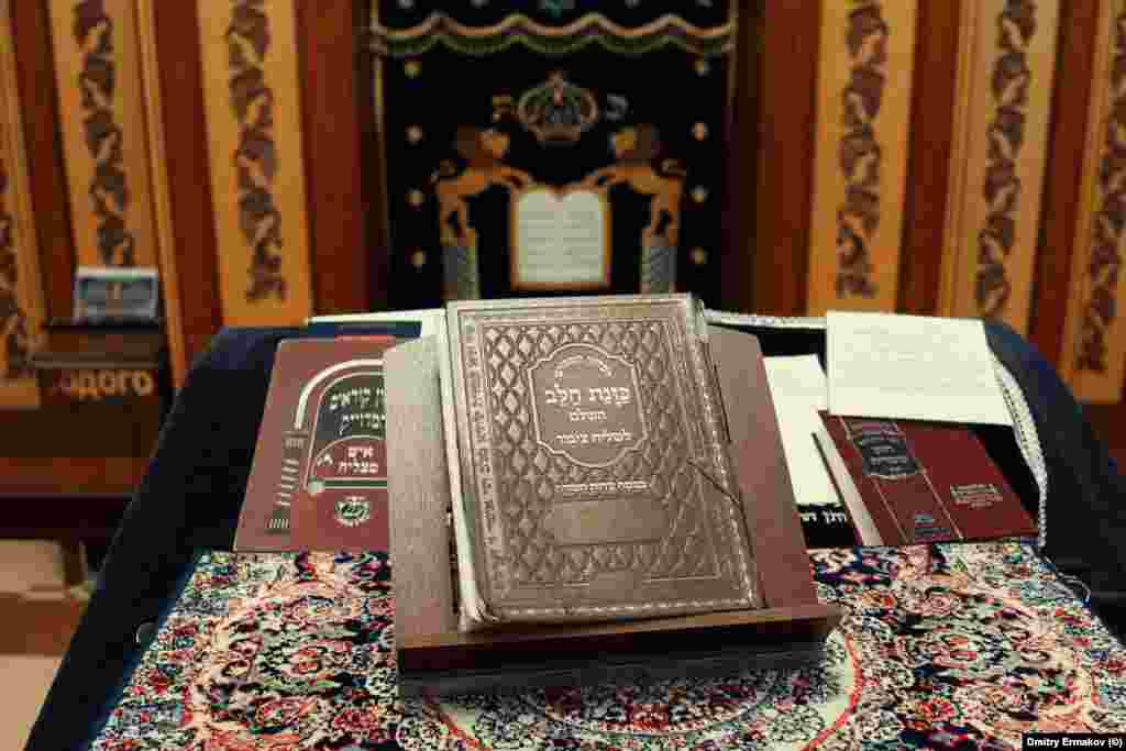 A religious book in the Derbent synagogue The October 29 violence is not the first time in recent years the Jewish population has been targeted. In 2013, Rabbi Isakov was shot through the chest in an assassination attempt, and in 2012 an explosive device went off next to the Derbent synagogue.   
