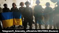 Скриншот из видео, обнародованного 27 июля 2023 года, на котором украинские военные говорят, что освободили от армии РФ село Старомайорское