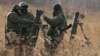 Rezerviștii ruși mobilizați parcurg antrenament de luptă la Centrul de Instruire al Districtului Militar Central – octombrie 2022.