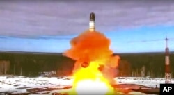 Russia launches a Sarmat intercontinental ballistic missile from Plesetsk, northwest Russia, on April 20, 2022.