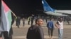 Protesters storm the runway of the airport in Makhachkala as a flight arrives from Israel late on October 29.