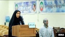 Amirhossein Maghsoudloo, aka Tataloo, (right) in court earlier this month.