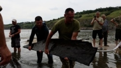 Receding Ukrainian River Reveals Archaeological Secrets Receding Ukrainian River Reveals Archaeological Secrets