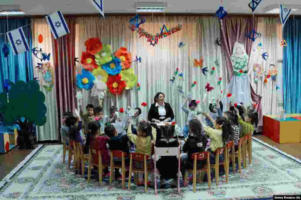 Children attend a Jewish kindergarten inside the Derbent synagogue in April 2023. In the final years of the Soviet Union, Jews began emigrating en masse out of Daghestan and elsewhere in the North Caucasus.  