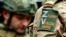 Шеврон российского военного на фронте в Украине