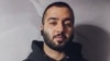 "They broke my arms and legs during my detention and hit me in the face and head a lot," rapper Toomaj Salehi said in a video posted on November 27. (file photo)