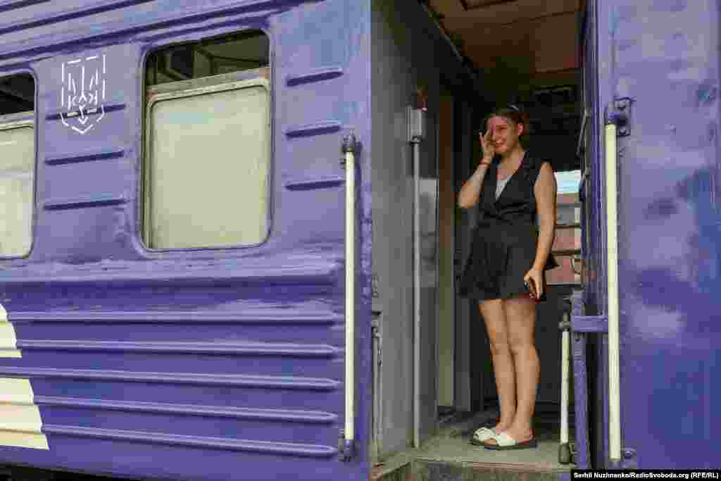 A young woman cries as she bids farewell to family members during an evacuation of Pokrovsk, in the Donetsk Region on August 30, 2024. 