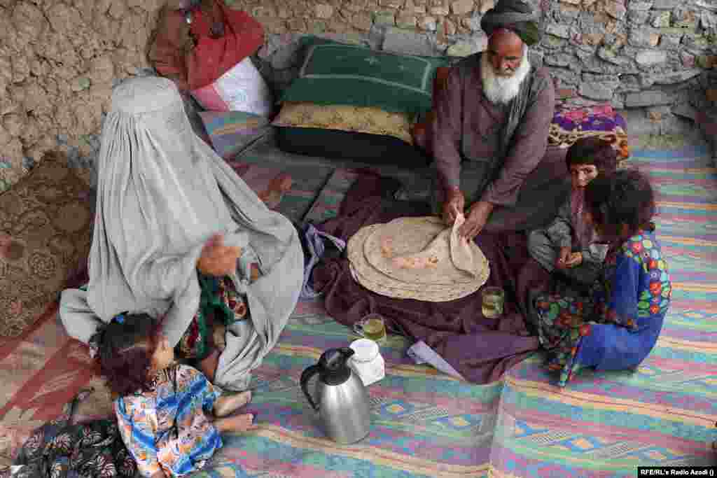 This family in Kandahar eats bread with tea for breakfast. Women and children are the most vulnerable to hunger. Earlier this year, the United Nations Children's Fund (UNICEF) warned that some 1.1 million Afghan children under the age of 5 risked dying of severe acute malnutrition, while more than 3.2 million children faced malnutrition.