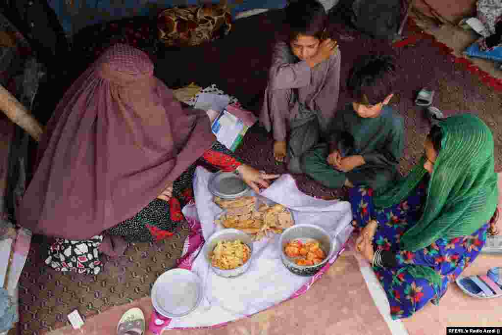 Pashtana, a widow, also lives in Kandahar city. She and her three children eat potatoes for lunch. Pashtana used to beg until it was banned in the city by the Taliban. The militant group provides her with a bag of flour, rice, and cooking oil each month. But she says this does not meet the family’s needs.