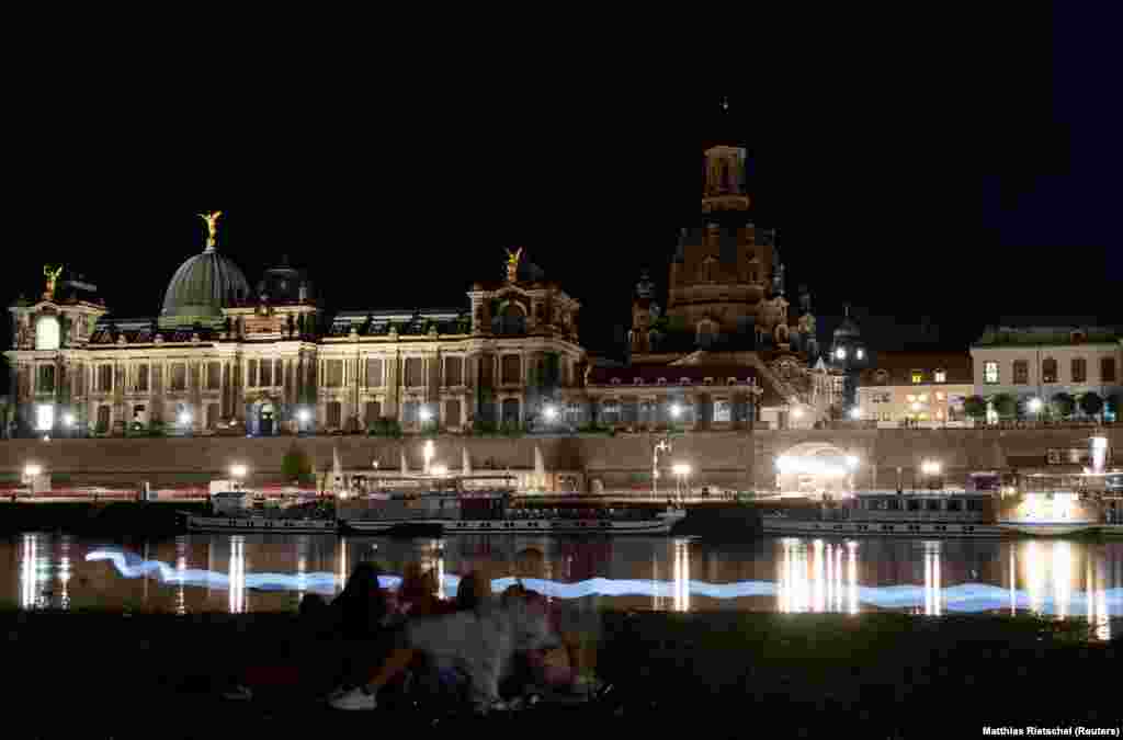 This is how the famed riverside of Dresden looked on the evening of August 22. Bright lights usually showcase the eastern German city's architecture, but in recent weeks the skyline has gone dark.   