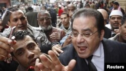Opposition politician Ayman Nour speaks during a rally on Cairo's Tahrir Square on February 1.