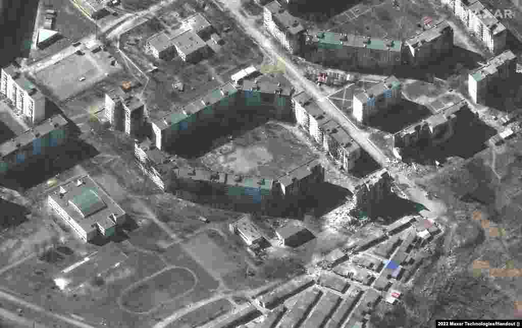 Разрушения жилых домов Мариуполя в результате российских обстрелов и бомбардировок, 22 марта 2022 года. Satellite image ©2022 Maxar Technologies