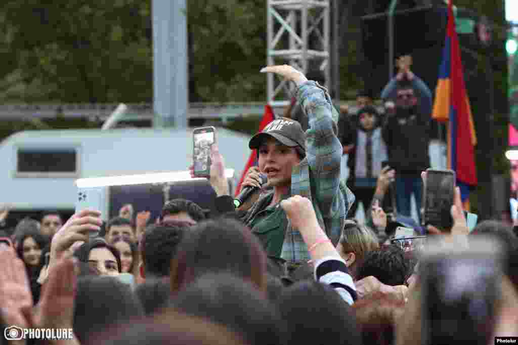 Armenian singer Sirusho performs during a demonstration in Yerevan calling for the resignation of Pashinian.  More than 200 people were detained by police on May 3, the day this photo was taken.  