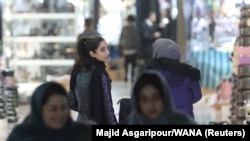 A growing number of Iranian women are appearing in public without the hijab, in a direct challenge to Iran's clerical regime.