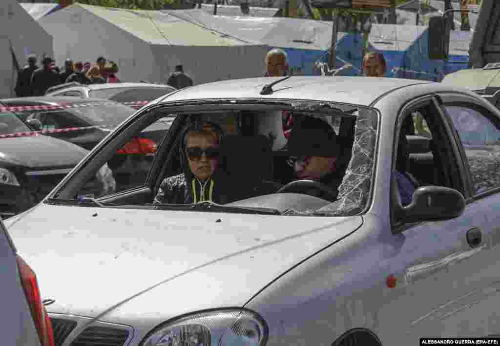 Civilians fleeing Mariupol wait at a checkpoint on May 7. The International Organization for Migration estimates that at least 7.1 million Ukrainians have been internally displaced since Russia launched its full-scale invasion on February 24.