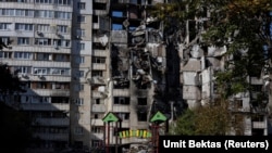 Разрушенное здание в районе Салтовки в Харькове, Украина, 22 сентября 2022 года.