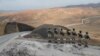 Turkish forces man the new border wall along the Turkish-Iranian border in Turkey's Van Province.
