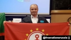 Анвар Курманакаев в здании Европарламента, фотография из телеграм-канала "Форум свободных народов постРоссии"