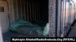 The bodies of dead Russian soldiers are collected in a refrigerator car at the Voznesensk railway station in Ukraine on March 16.