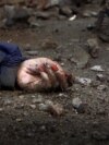 Российских военных обвиняют в убийствах мирных жителей в Буче Российских военных обвиняют в убийствах мирных жителей в Буче