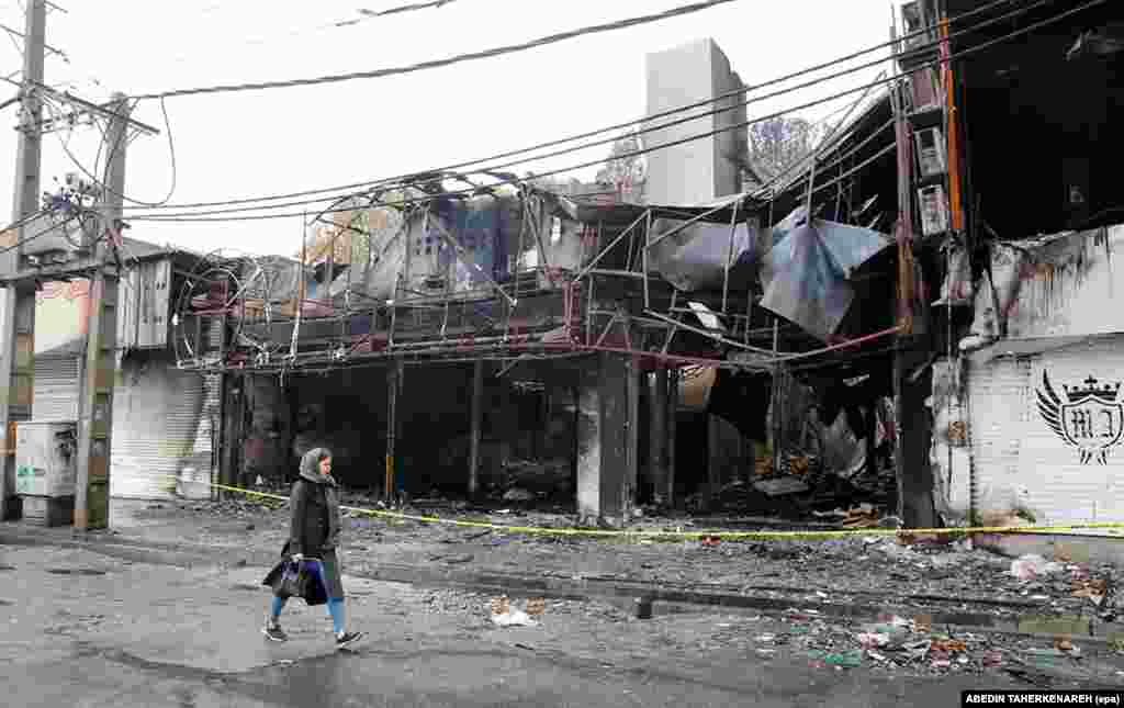 A destroyed shopping center in Shariar. Around one-third of Iranians described themselves as "suffering" after U.S. sanctions were renewed in 2018. 