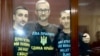 Нариман Джелял, Асан и Азиз Ахтемовы на заседании подконтрольного России Киевского районного суда Симферополя, Крым, 21 сентября 2022 года