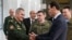 Министр обороны России Сергей Шойгу встречается с Башаром Асадом во время очередного визита в Дамаск – без всяких защитных масок. 23 марта