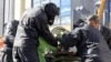 An accused thief has his fingers amputated in Iran. (file photo)
