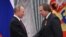 Владимир Путин награждает Сергея Ролдугина орденом Александра Невского за заслуги в подготовке и проведении гуманитарных внешнеполитических акций. Москва, Кремль, 22 сентября 2016 года