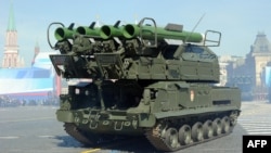 A Russian Buk-2M missile launcher is displayed on Red Square in Moscow during the Victory Day parade on May 9, 2013.