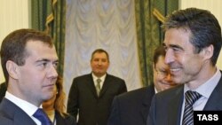 Russian President Dmitry Medvedev (left) meets with NATO Secretary-General Anders Fogh Rasmussen in Moscow.