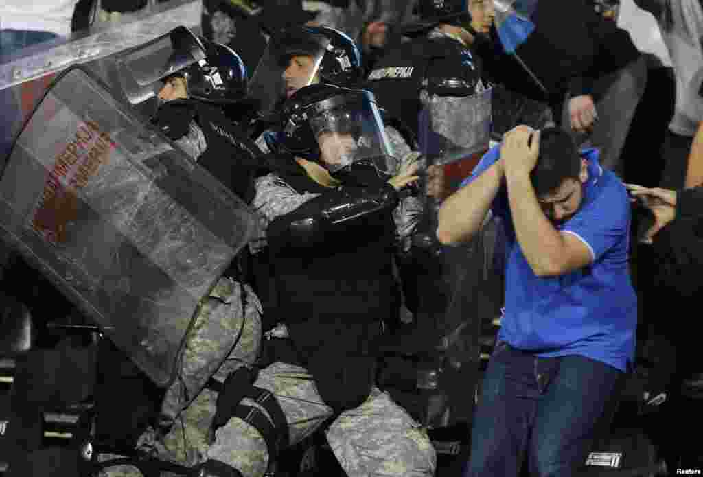 Serbian riot police clashed with the fans during the match...