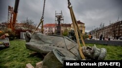 The monument to Marshal Konev lies on the ground after being removing from its pedestal in Prague on April 3.