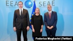 The EU's Federica Mogherini (middle), Kosovo's Hashim Thaci (right) and Serbian president Aleksandar Vucic meet.