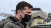 Ukrainian President Volodymyr Zelenskiy visits a military fortification on April 27 in an area bordering the Crimean Peninsula, which was forcibly seized by Russia in 2014.