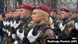 Police officers of the Republika Srpska march during a parade in Banja Luka on January 9.