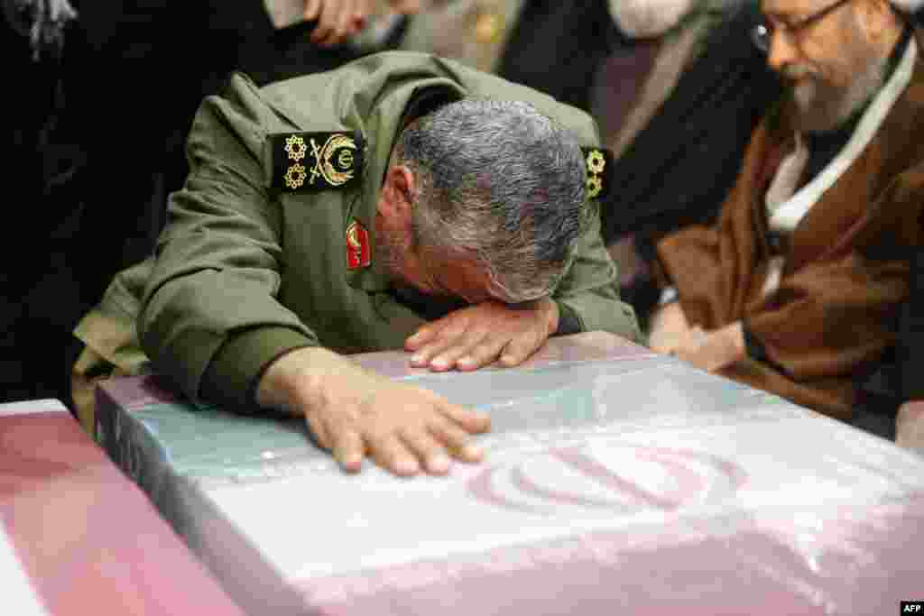 The new Quds Force leader, General Ismail Qaani, wept on the flag-draped coffin of his slain predecessor, Qasem Soleimani.