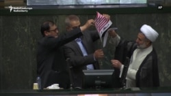 Iranian Lawmakers Burn U.S. Flag In Parliament Iranian Lawmakers Burn U.S. Flag In Parliament
