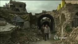 Сирийские военные пустили жителей Алеппо в городскую цитадель (видео) Сирийские военные пустили жителей Алеппо в городскую цитадель (видео)