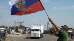 Российские грузовики пересекли украинскую границу Российские грузовики пересекли украинскую границу