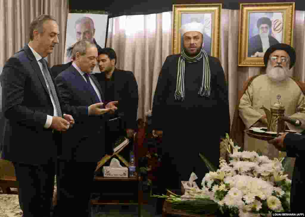 Syrian Deputy Foreign Minister Faisal Miqdad (second left) attended a memorial service for Soleimani in the Syrian capital, Damascus. Iran's Quds Force had shored up support for Syrian President Bashir al-Assad when he looked close to defeat.