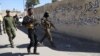 Iraqis To The Rescue? Iranians Wary Of Paramilitary Forces Sent For 'Flood Relief' Efforts